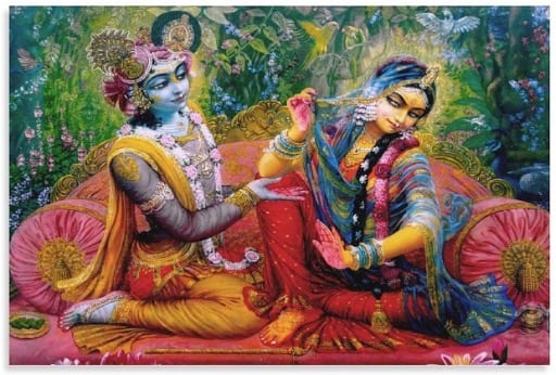 Krishna and Radha seated together in a flowering garden